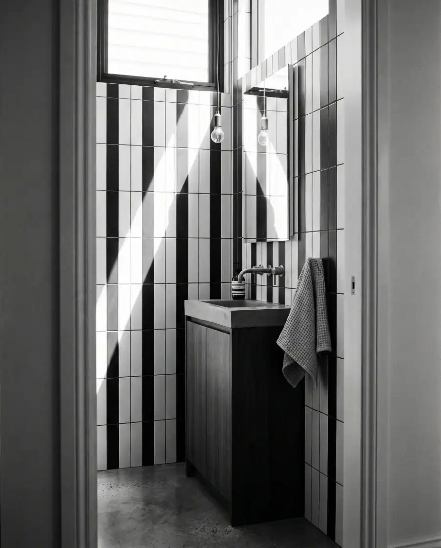 Narrow Black-and-White Half Bath 2