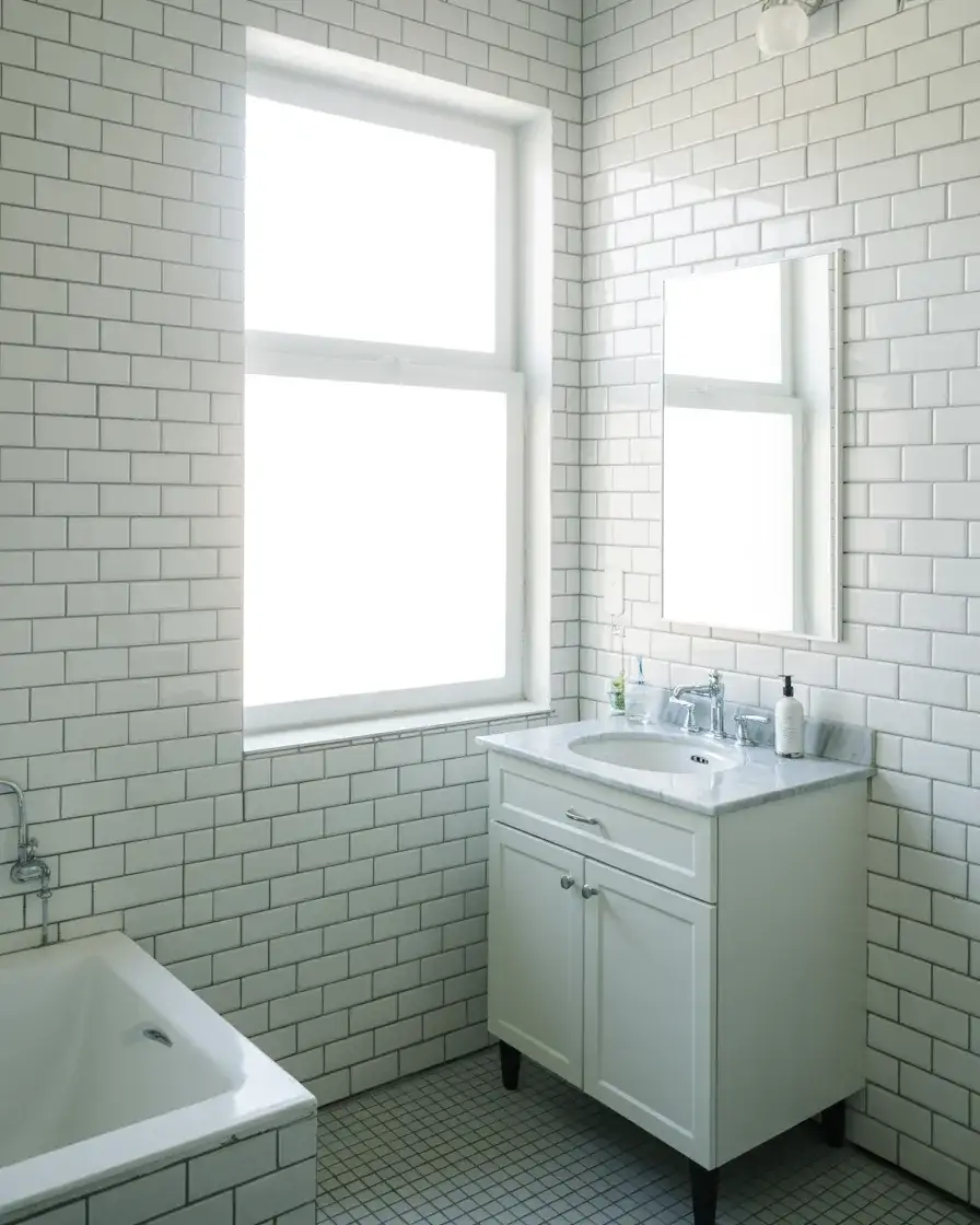 Classic White Bathroom With a Bright Vanity 2