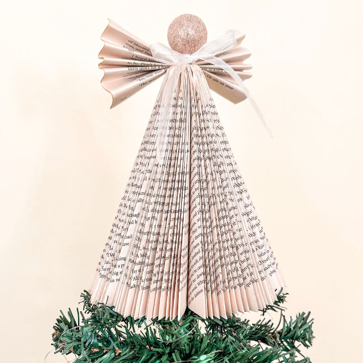 10 DIY Folded Book Page Ornaments and Christmas Tree Toppers