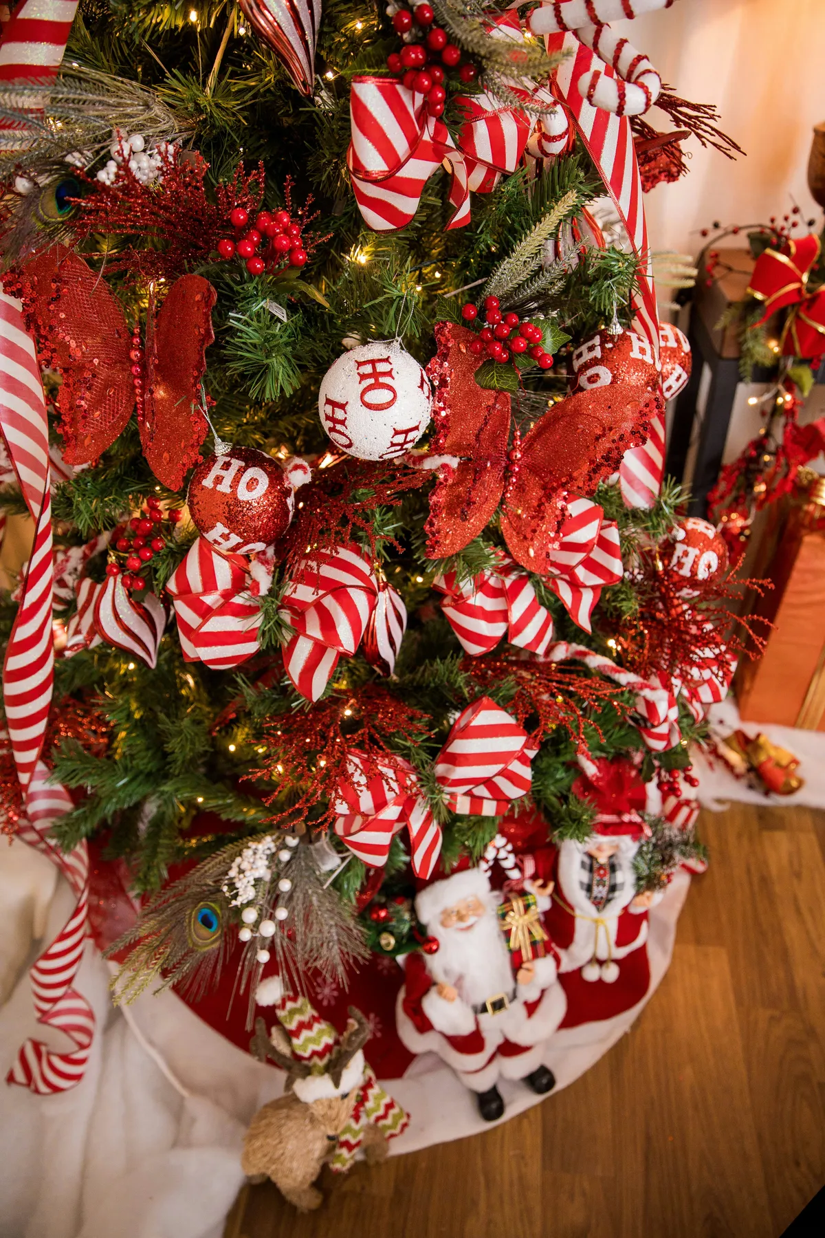 a christmas tree decorated with candy canes and ornaments