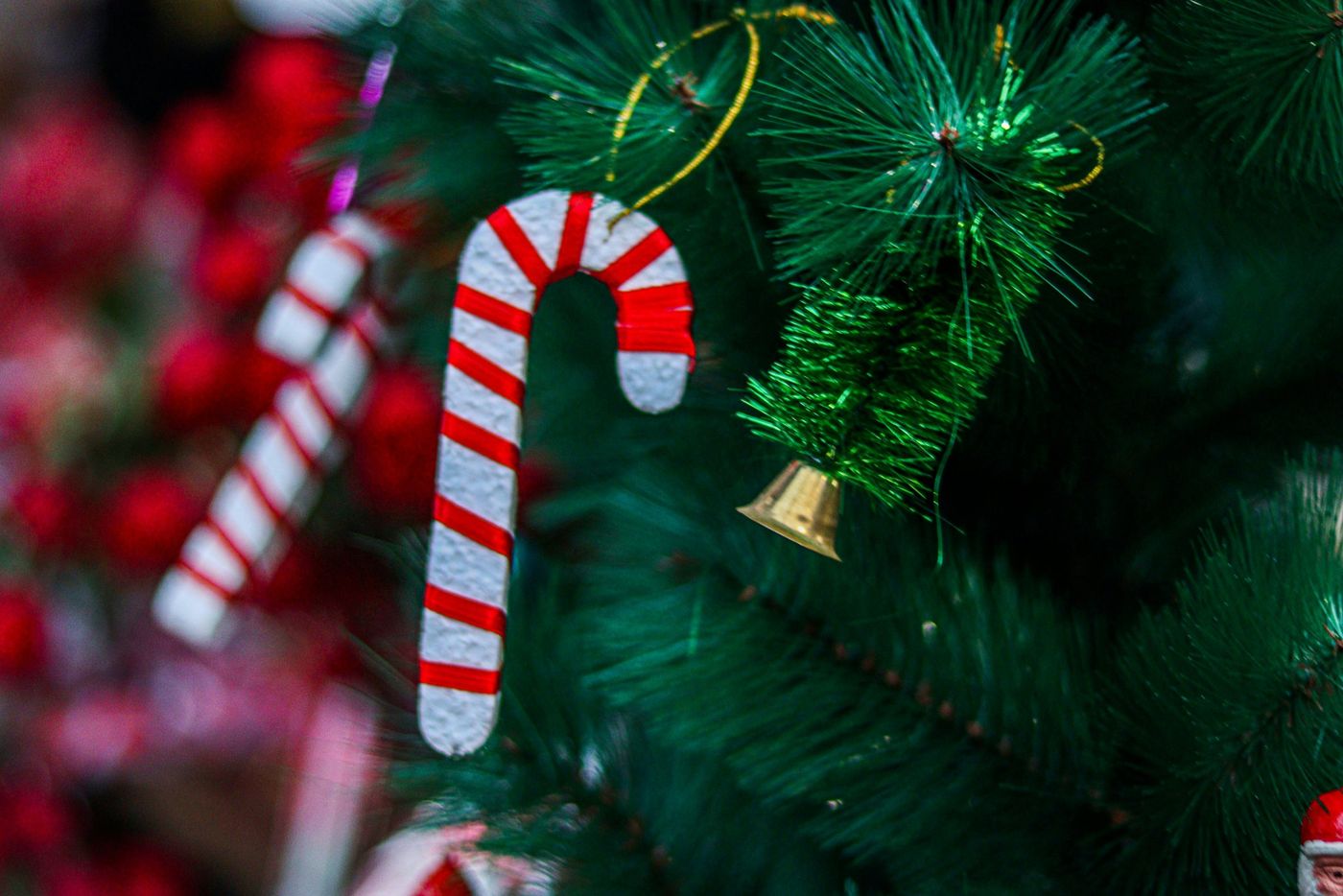 a christmas tree decorated with candy canes and ornaments