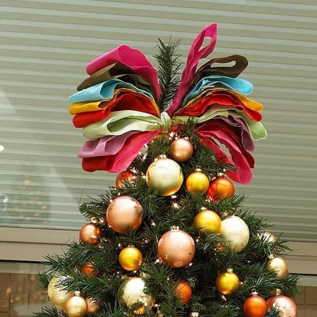 Holiday Tree Toppers Adding Final Touches to Modern Christmas Tree  Decorating