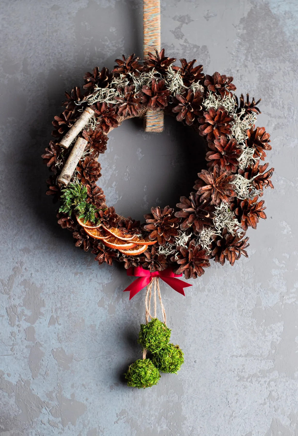 Holiday Wreath Decorated With Pinecones and Ornaments Hangs Rustic Pinecone  Holiday Wreath