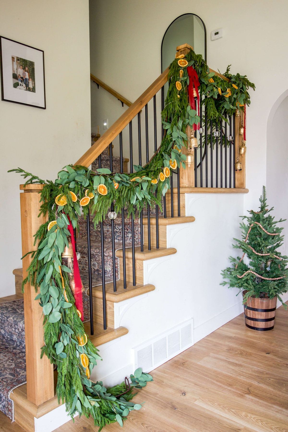 How to Decorate With Christmas Garland on a Staircase | Crystel Montenegro  Home