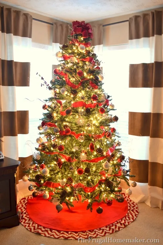 Red and white Christmas tree with natural elements