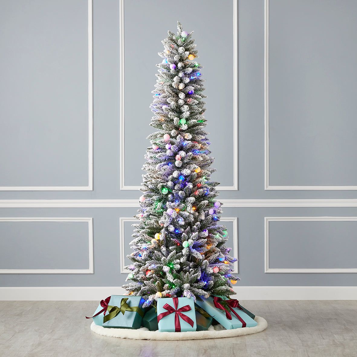 Snow Kissed Slim Flocked Pine Pre-Lit Tree with Multicolor LED Lights 7 ft
